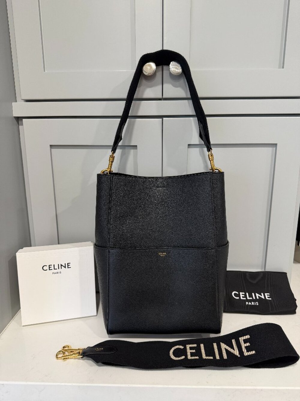 CELINE Seau Sangle Bag in Black Grained Calfskin + Jacquard Strap